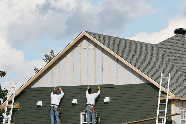 Professional Vinyl Siding technician working in Cocolamus, PA